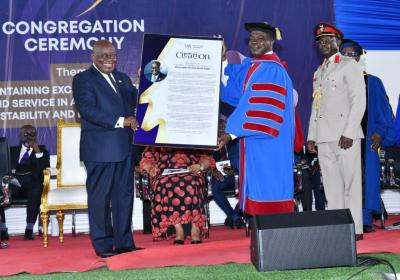 H.E. President Nana Addo Dankwa Akufo-Addo receiving Citation from Pr. (Prof.) Robert Osei-Bonsu - VVU Chancellor. 7-7-2023